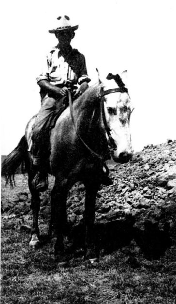 Carlyle Smith on horseback